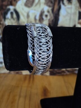 Elegant Silver-Tone Woven Hoop Bracelet